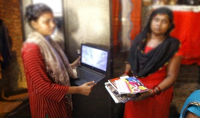 Sisters of the alleged Balrampur rape victim, who aspired to be a lawyer, with her books and laptop | Praveen Jain | ThePrint