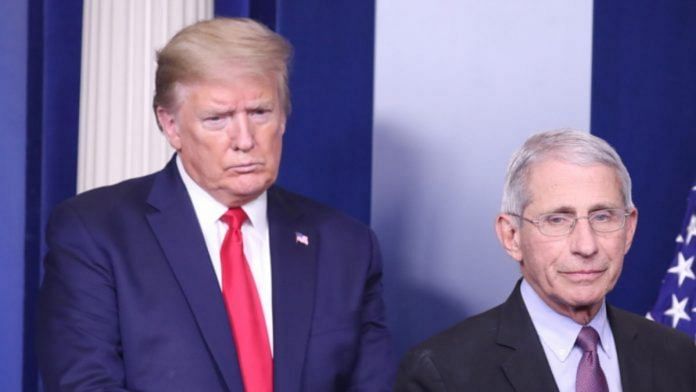 File photo of US President Donald Trump and Anthony Fauci, director of the National Institute of Allergy and Infectious Diseases, during a news conference at the White House on 22 April | Michael Reynolds | EPA via Bloomberg