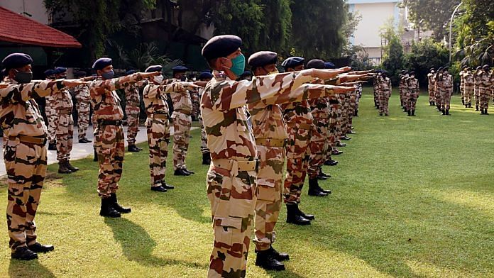 ITBP personnel taking oath for Coivd precautions at Force headquarters in New Delhi
