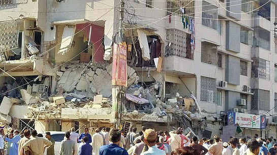 Remains of the building in which explosion took place in Karachi on 21 October