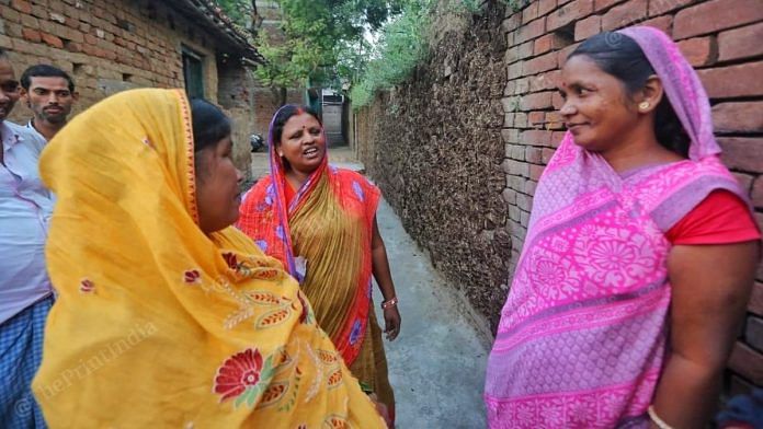 Sheela Devi, 45, chats with other residents of Parew village in Maner constituency. She claims CM Nitish Kumar has done good work but some concerns remain | Praveen Jain | ThePrint