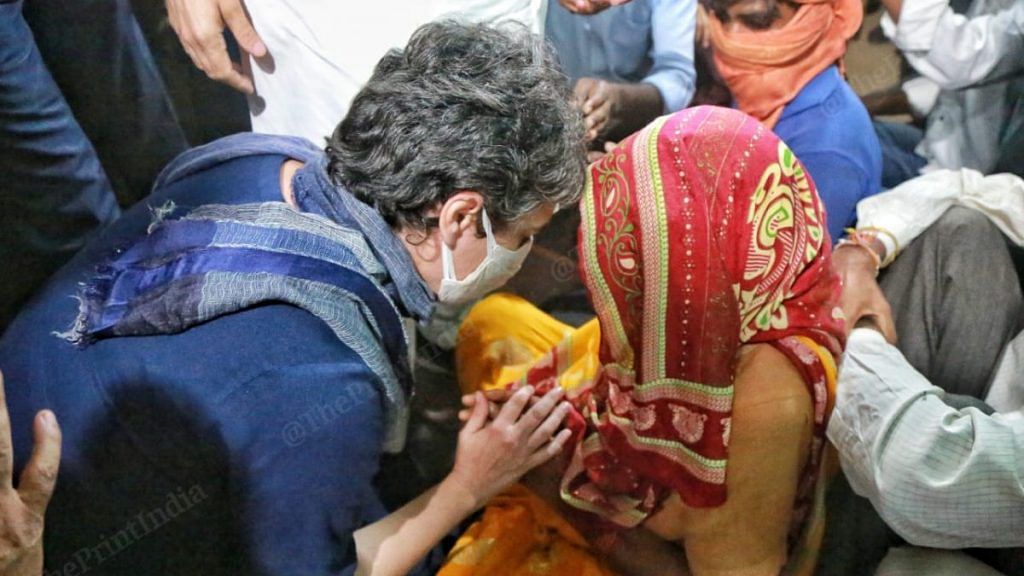 Priyanka Gandhi comforts the family of the Dalit woman who was allegedly raped and murdered in Hathras, UP, on 3 October, 2020 | Photo: Manisha Mondal | ThePrint