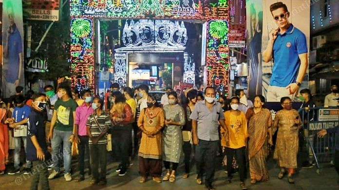 People at a Durga Puja pandal in Kolkata (representational image) | Manisha Mondal | ThePrint