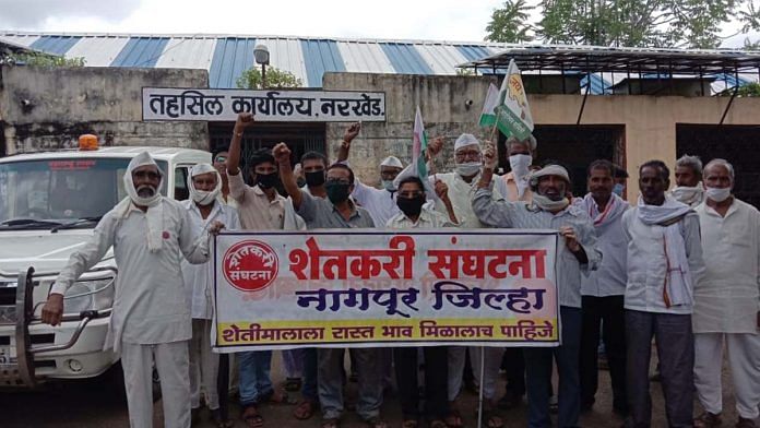 Farmers associated with Shetkari Sanghatana gather outside the tehsildar’s office in Nagpur district to celebrate the farm laws | By special arrangement