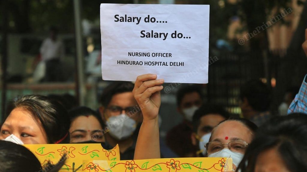 Hindu Rao Hospital doctors and nurses, who are on Covid duty, protesting outside the hospital Wednesday against NDMC over non-payment of dues. | Photo: Suraj Singh Bisht/ThePrint