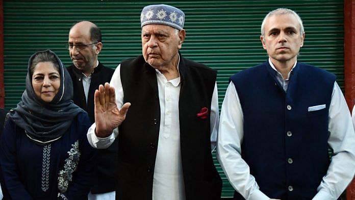 A file photo of National Conference president Farooq Abdullah and his son Omar Abdullah, and PDP chief Mehbooba Mufti after an all-party meeting in Srinagar. | Photo: ANI