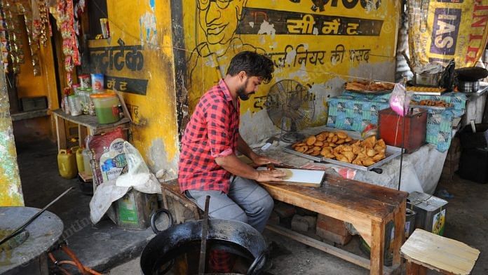 Dukendra Prakash, a national level shooter and a resident of Aligarh's Kastali Vaishya village, was forced to open a food stall in his village in April after his stadium shut down due to the lockdown. | Photo: Suraj Singh Bisht/ThePrint