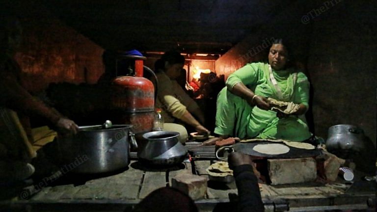 Farmers chop vegetables for dinner, women make rotis — scenes after chaos at Delhi border
