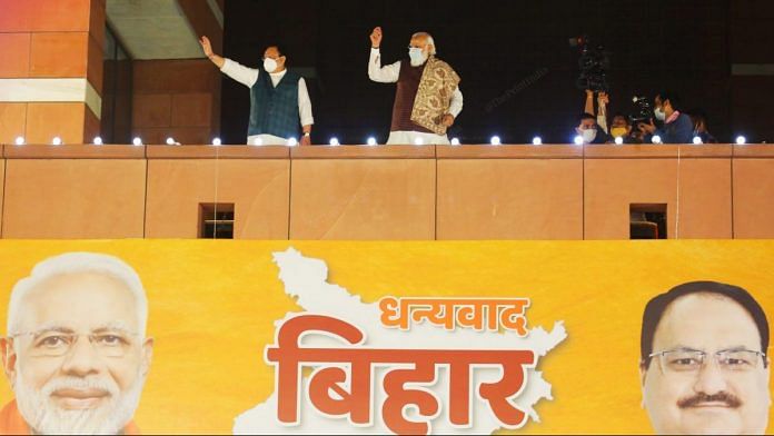 BJP President J.P. Nadda left) and PM Narendra Modi right) addressing the crowd | Photo: Praveen Jain | ThePrint
