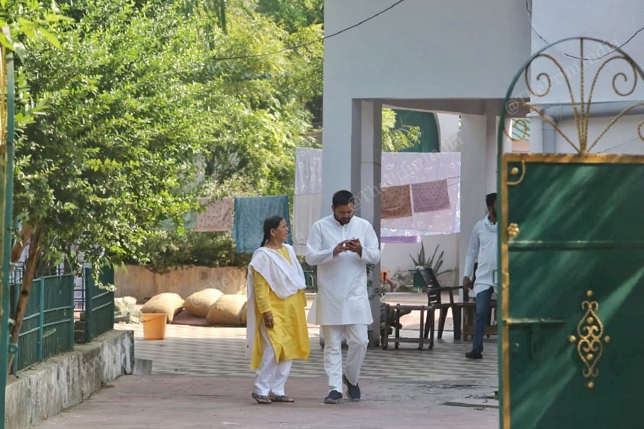 Before leaving to the election campaign Tejashwi Yadav with her mother rabri Devi discussing outside their house | Praveen Jain | ThePrint