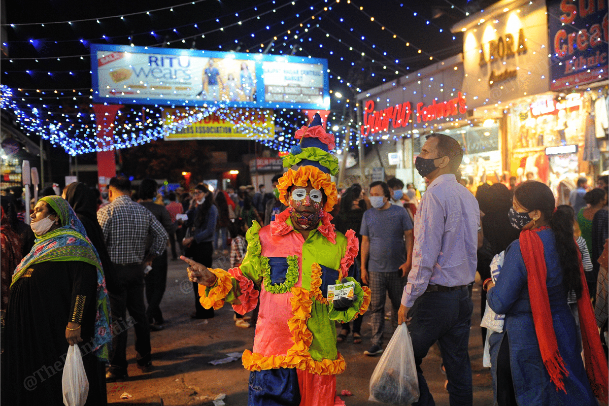 A clown at Lajpat Nagar market | Photo: Suraj Singh Bisht | ThePrint