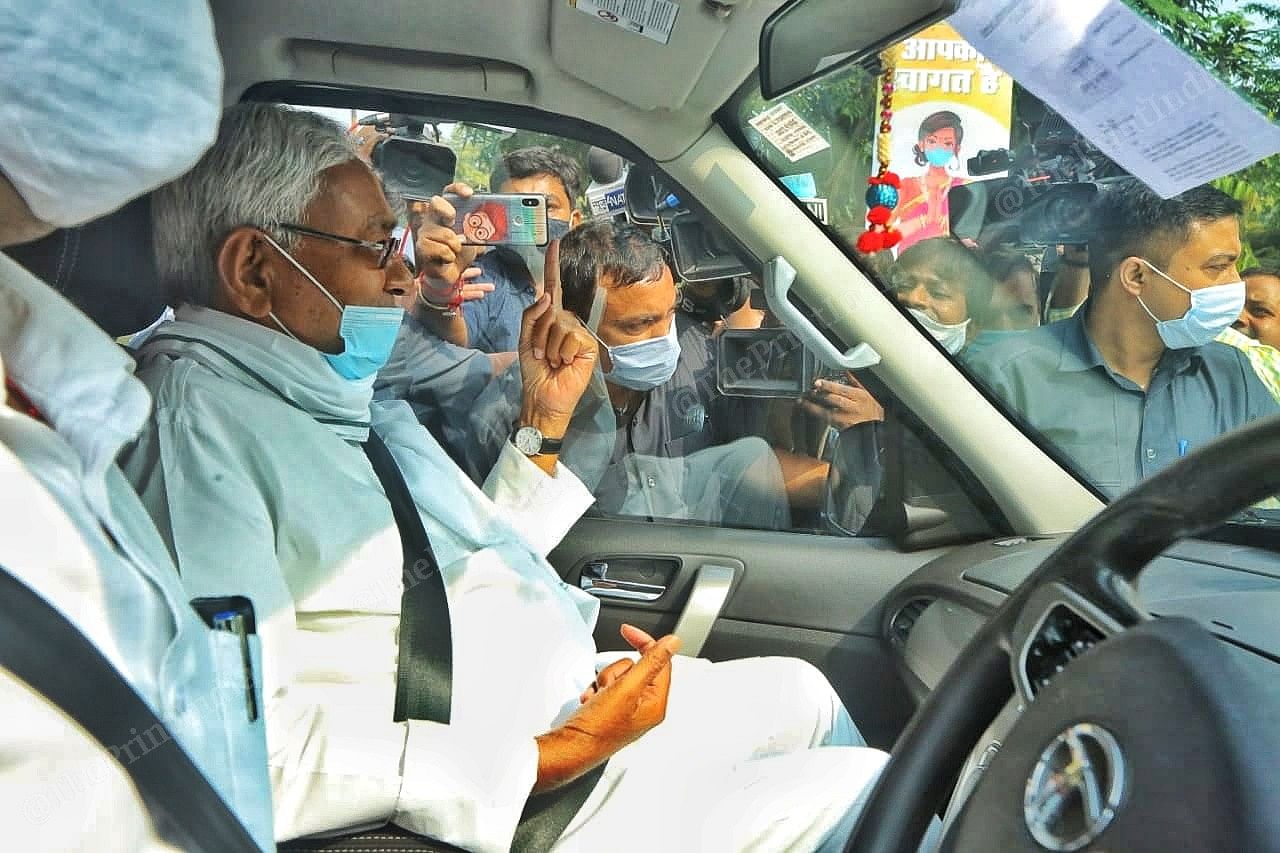 Chief Minister of Bihar Nitish Kumar shows his finger after casting his vote at Raj bhavan complex | Praveen Jain | ThePrint