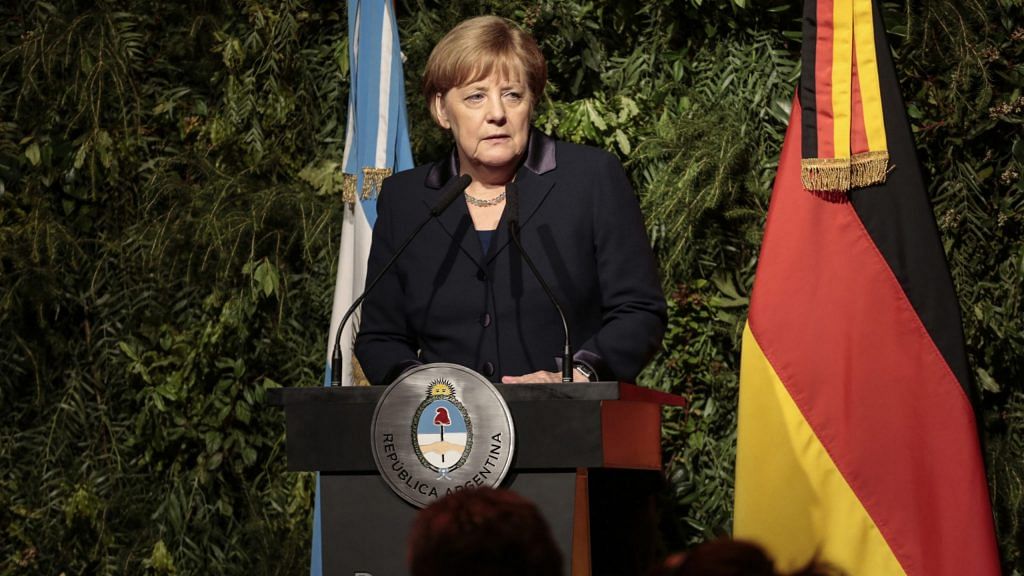 File photo of Germany's chancellor Angela Merkel speaking during an official dinner | Photographer: Sarah Pabst | Bloomberg