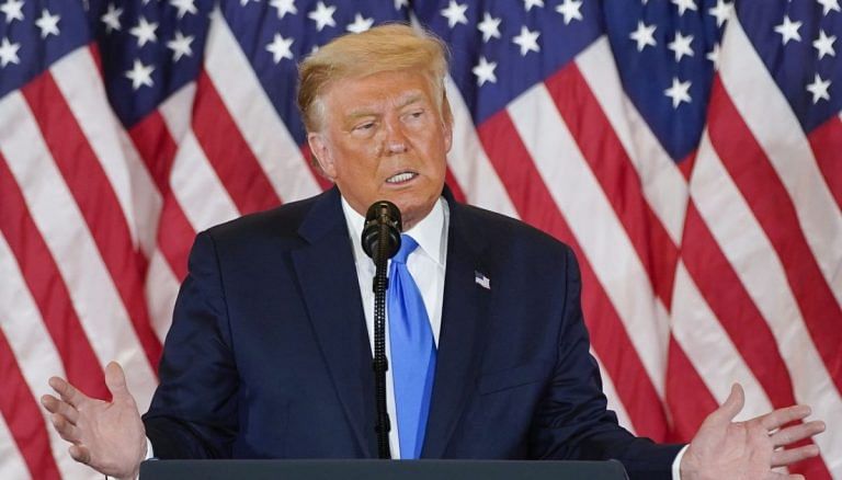 Trump team draws up contradictory strategy to win US election as key states count votes