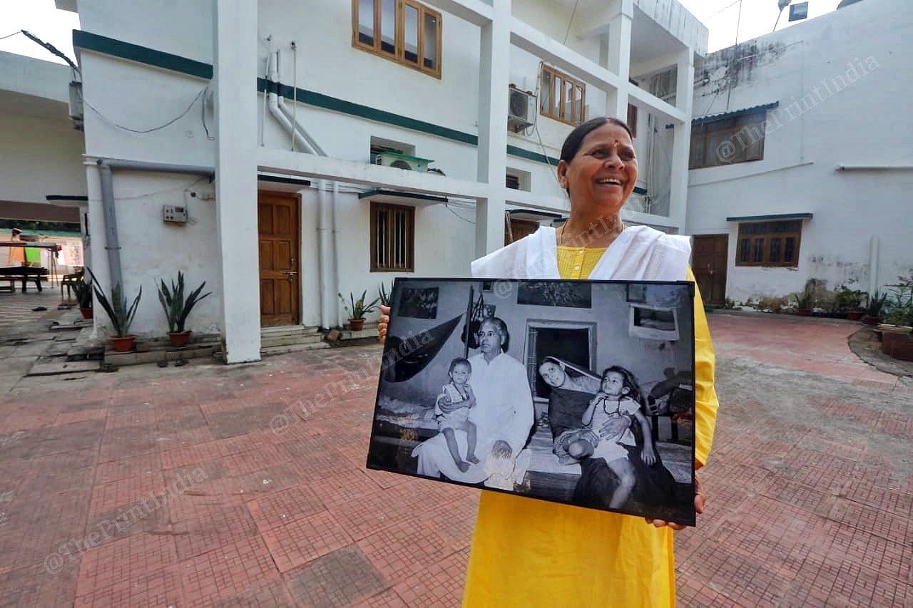 Former CM of Bihar Rabri Devi outside her residence holding old photographs of mine in the cheerful mood| Praveen Jain | ThePrint