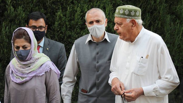 Members of the Peoples Alliance for Gupkar Declaration (PAGD) Farooq Abdullah, Mehbooba Mufti, Omar Abdullah and others during a press conference after their meeting, at Bathindi in Jammu, on 7 November 2020 | PTI