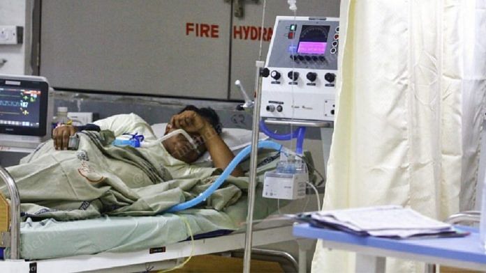 Representational image of a Covid patient in a hospital bed | Photo: Praveen Jain | ThePrint