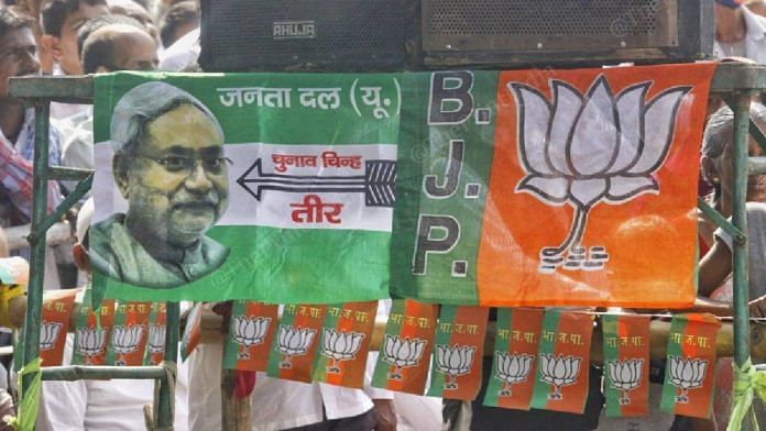 Flags of the JD(U) and the BJP at a campaign rally in Bihar | Praveen Jain | ThePrint