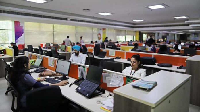 Representational Image | People working at an office | Anindito Mukherjee | Bloomberg