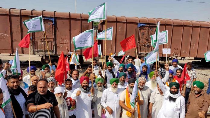 Punjab farmers protesting against the Modi government's farm laws in front of a goods train at Phillaur railway station | File photo: ANI