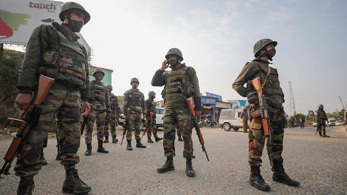 Security personnel inspect the site of encounter at Nagrota Ban toll plaza in Jammu on 19 November | PTI