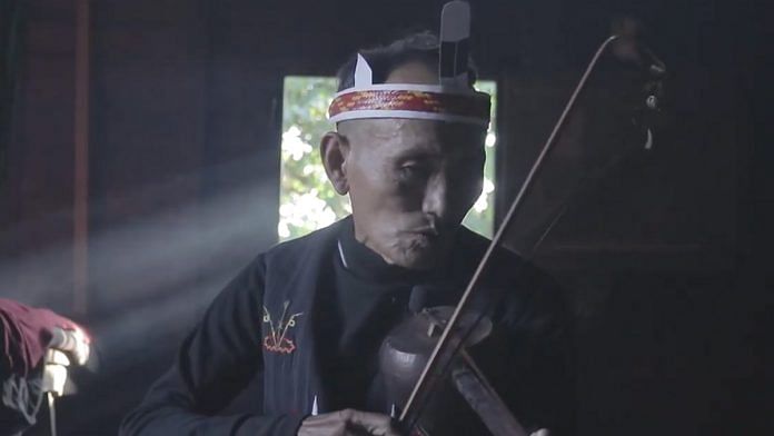 Ningmaso Awungshi playing the Tingteilla, a traditional instrument of Tangkhul Nagas | Credits: Kora Studios | YouTube