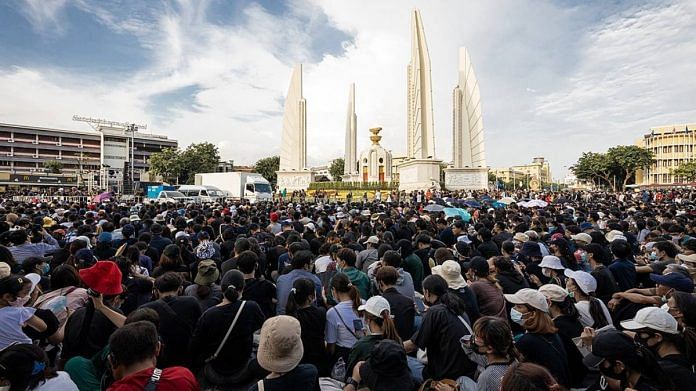 Pro-democracy protesters take part in a demonstration at the Democracy Monument in Bangkok | Commons