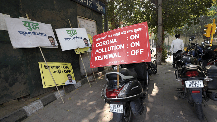 Placards displayed during a BJP protest against the Delhi government over the issue of pollution and the rise in Covid cases | PTI