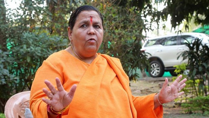 Senior BJP leader Uma Bharti speaks to media after the party's victory in MP State Assembly by-elections, at her residence, in Bhopal on Wednesday | ANI Photo