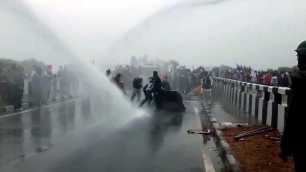 Police use water cannon to disperse farmers who have gathered in Kurukshetra to proceed to Delhi to stage a demonstration on 25 November 2020 | ANI