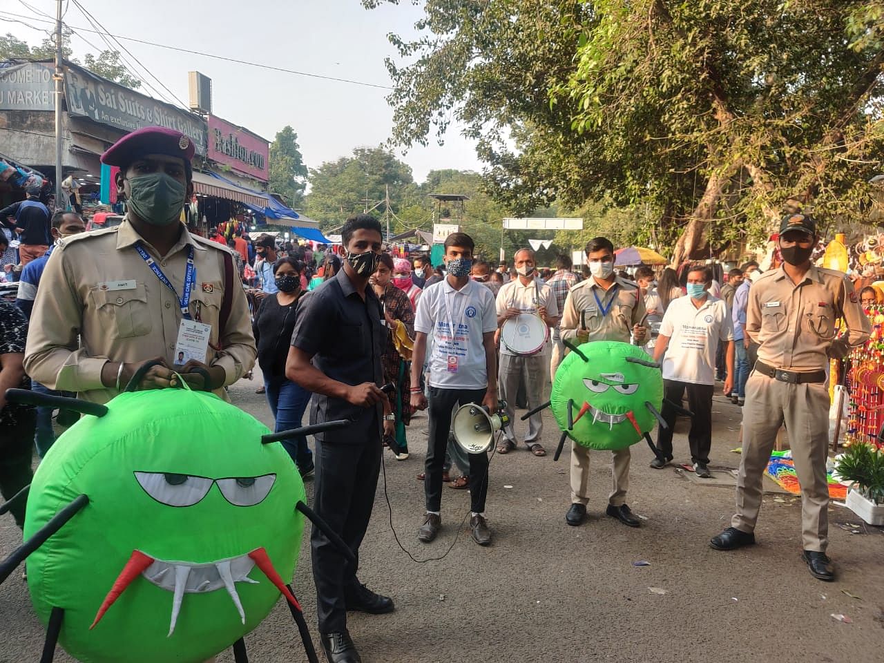 District authorities along with civil defence personnel carried a coronavirus stuffed toy to raise awareness about Covid norms | Photo: Bismee Tasking | ThePrint