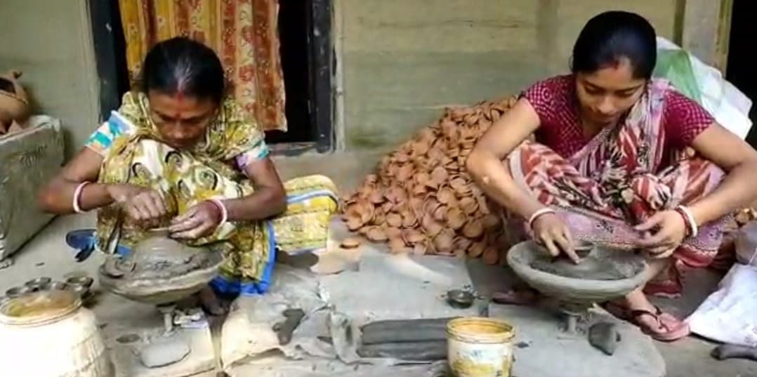 A family in the Mailbazar area of Gohpur, Assam, makes earthen lamps | By special arrangement