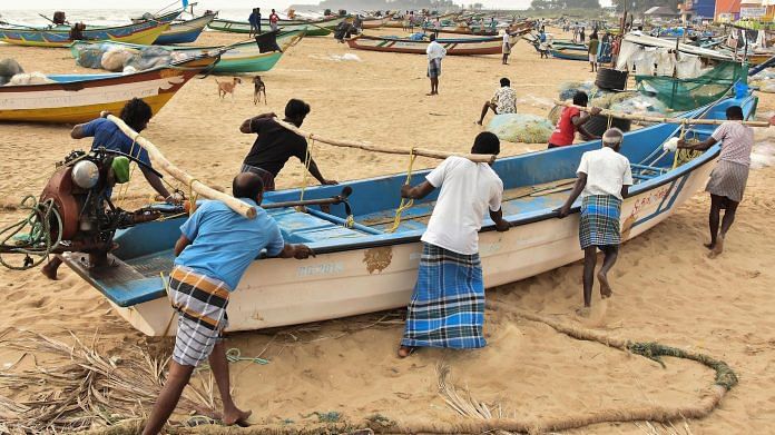 Fishermen shift their boats for safety following Cyclone Nivar alert, in Mamallapuram on 23 November | PTI Photo