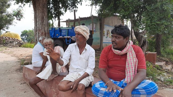 Villagers in Davanagere's Arasapura village, where a Covid-negative certificate is now being asked for from those seeking entry. | Photo: Rohini Swamy/ThePrint