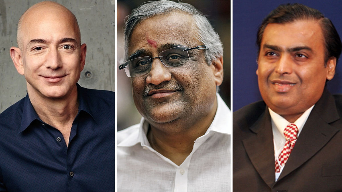 re 3 (From L-R) Jeff Bezos , Kishore Biyani and Mukesh Ambani