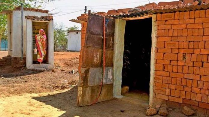 A woman walks out of a village toilet | Representational image | Commons