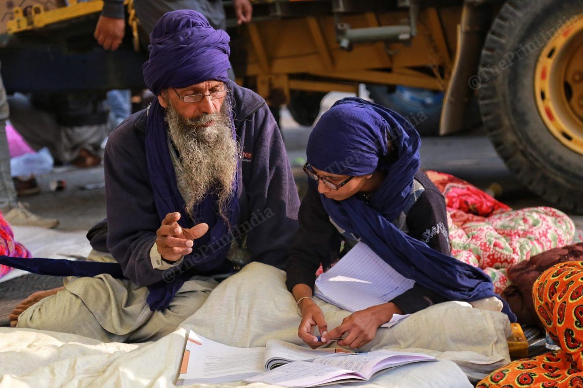 Gursimrat Kaur's father help her to solve problems | Photo: Manisha Mondal | ThePrint