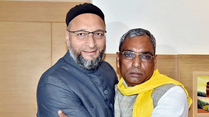 AIMIM chief Asaduddin Owaisi with SBSP president Om Prakash Rajbhar in Lucknow Wednesday | Photo: ANI