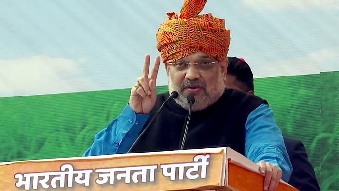 Union Home Minister Amit Shah addresses a public rally at Mehrauli in New Delhi on Thursday. | ANI