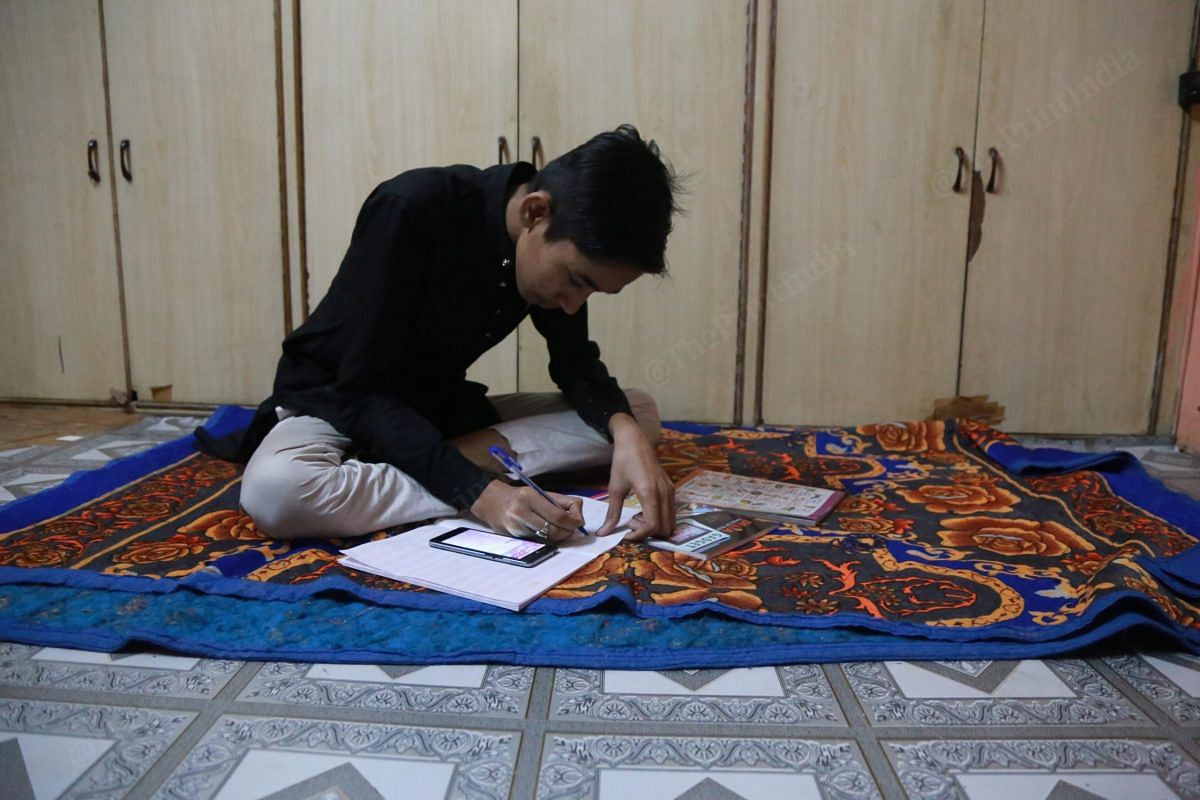 He has started taking online classes | Photo: Manisha Mondal | ThePrint