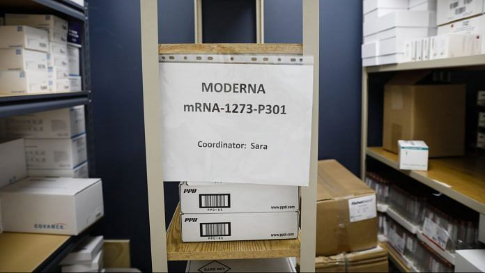 A Moderna Inc. sign is displayed on a shelf during clinical trials for a Covid-19 vaccine at Research Centers of US | Eva Marie Uzcategui | Bloomberg