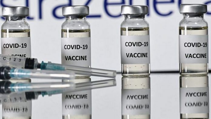 Vials with Covid-19 vaccine | Photo: Justin Tallis | AFP | Getty Images | via Bloomberg