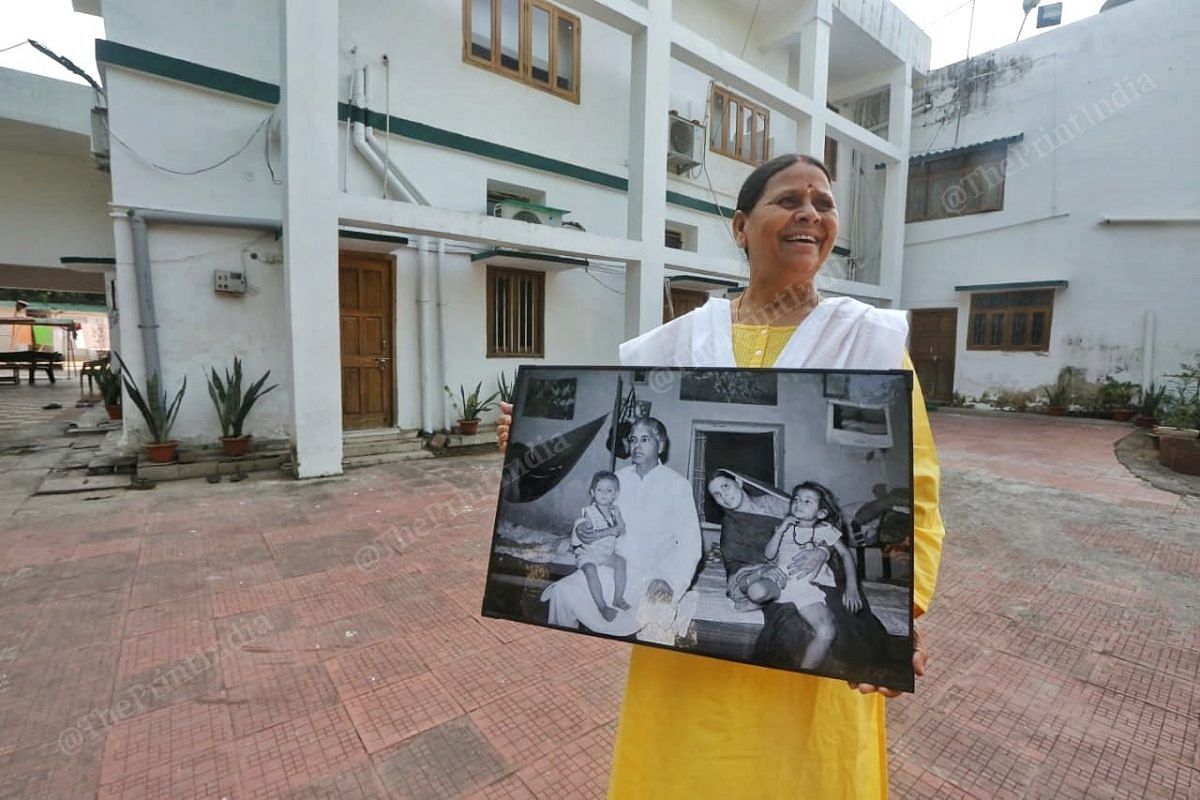 Rabri Devi holds a family picture | Photo: Praveen Jain | ThePrint