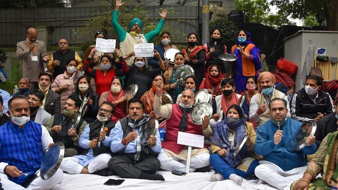 Mayor of North Delhi Jai Prakash and other senior functionaries during a protest outside Delhi Chief Minister Arvind Kejriwal's residence in New Delhi, on 12 December | PTI