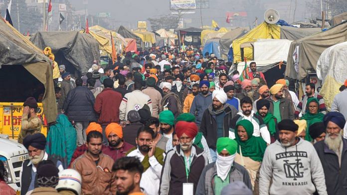 Farmers at Singhu border who have been protesting against three new farm laws, in New Delhi 26 December 2020 | Kamal Singh | PTI