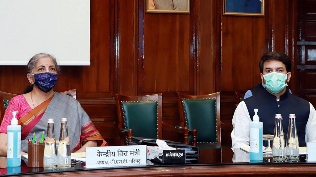 File photo | Finance Minister Nirmala Sitharaman along with MoS Anurag Thakur chairing the GST Council meeting via video conferencing, in New Delhi on Monday | ANI