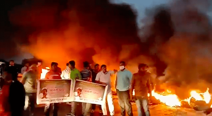 Protesters block highways in Gujarat by placing burning tyres on the road as part of Bharat Bandh | Ishani Parikh @ishaniparikh (ANI)/Twitter