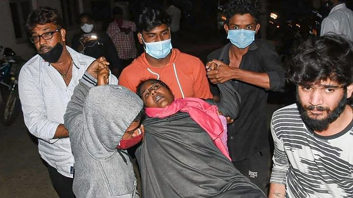 A woman showing symptoms of epilepsy being taken to a hospital in Eluru of West Godavari district on 6 December. | Photo: PTI