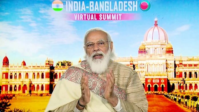 Prime Minister Narendra Modi during the India-Bangladesh summit. The image of the Cooch Begar Palace in the background was a symbolic message to the Bengali electorate, appealing to its nationalism. | Photo: ANI