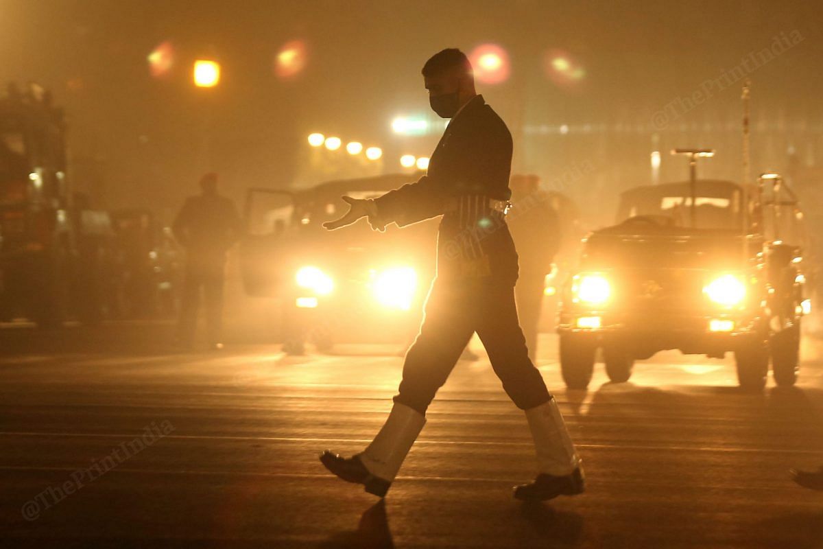 A Indian Navy officer walks across Rajpath during the Republic Day parade practice Wednesday| Photo: Suraj Singh Bisht | ThePrint